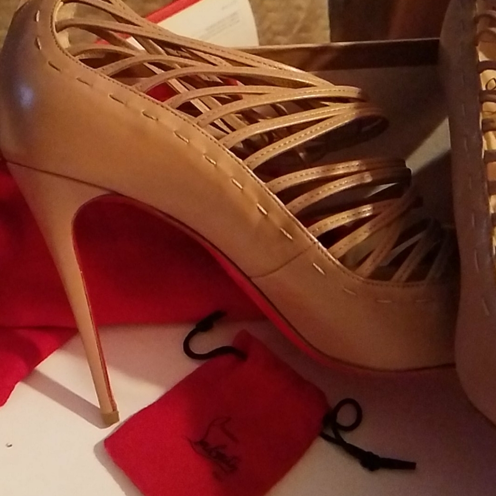 Louboutins 41 1/2 Tan , only worn twice.